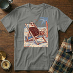 Eagle in sunglasses relaxes in a beach chair with a palm tree on a tropical beach.