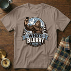 Bigfoot taking a selfie with mountains and trees, text "WHO'S BLURRY NOW?".