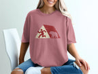 Runner and bear silhouetted against a red and white triangular mountain graphic.