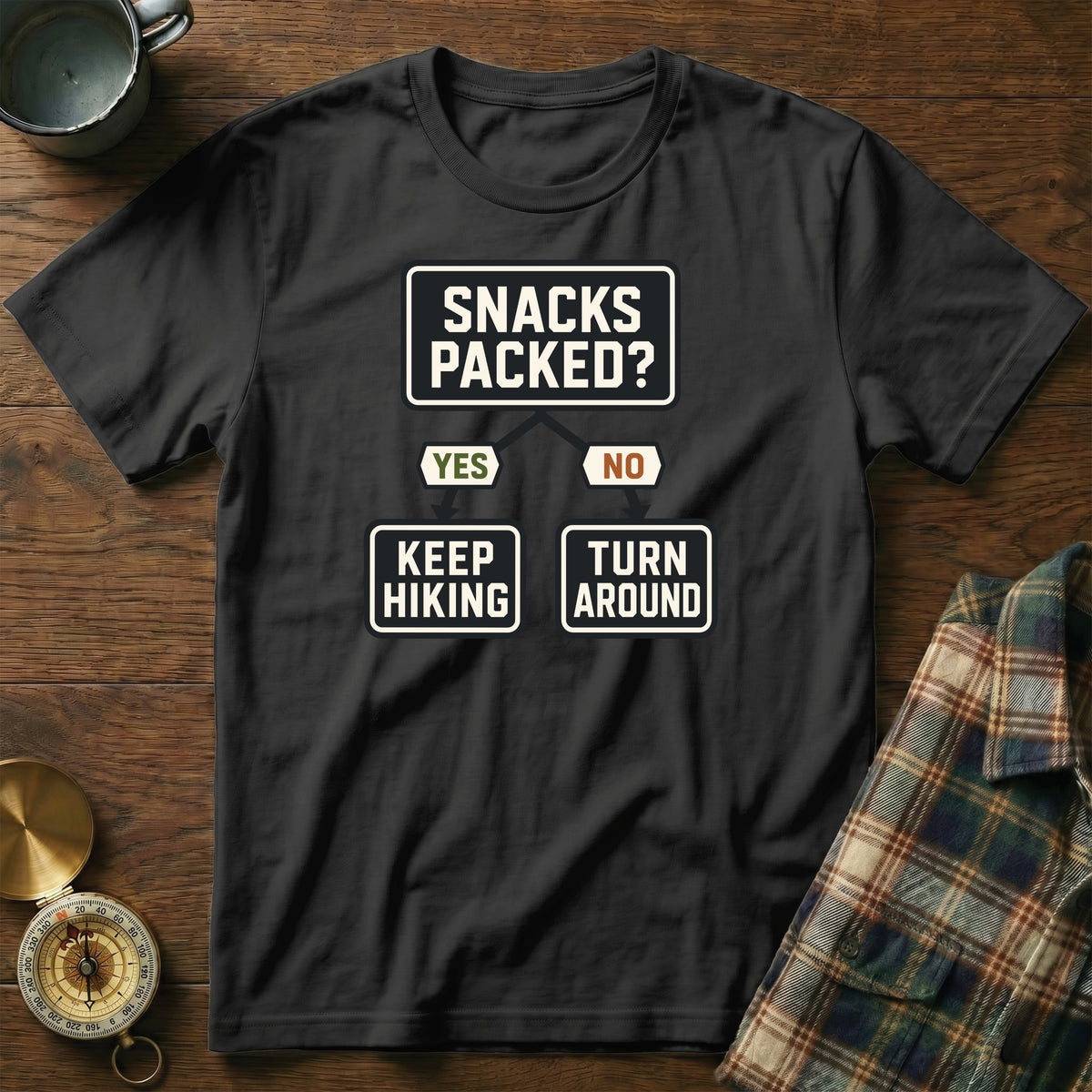 Black t-shirt with flowchart: "Snacks Packed? Yes Keep Hiking, No Turn Around."