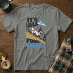 A gray t-shirt featuring a graphic of a mountain goat sliding downhill and the text It's All Downhill From Here.