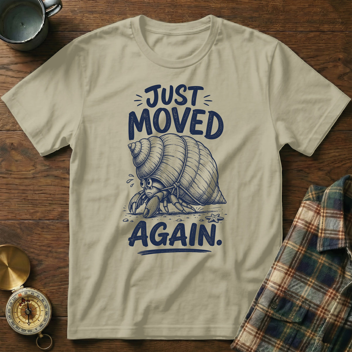 Hermit crab t-shirt with text "Just Moved Again".
