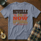 A slate blue t-shirt printed with the text REVEILLE IS NOW OPTIONAL EFFECTIVE IMMEDIATELY.