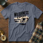 T-shirt with "WILDERNESS EXPERT" text and beach chair illustration.
