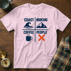 Pink t-shirt with text "Coast Mountains Coffee People" and icons for waves, mountains, coffee, and an X.