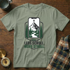 T-shirt with phone graphic, mountains, and text "LESS SCROLL. MORE STROLL."