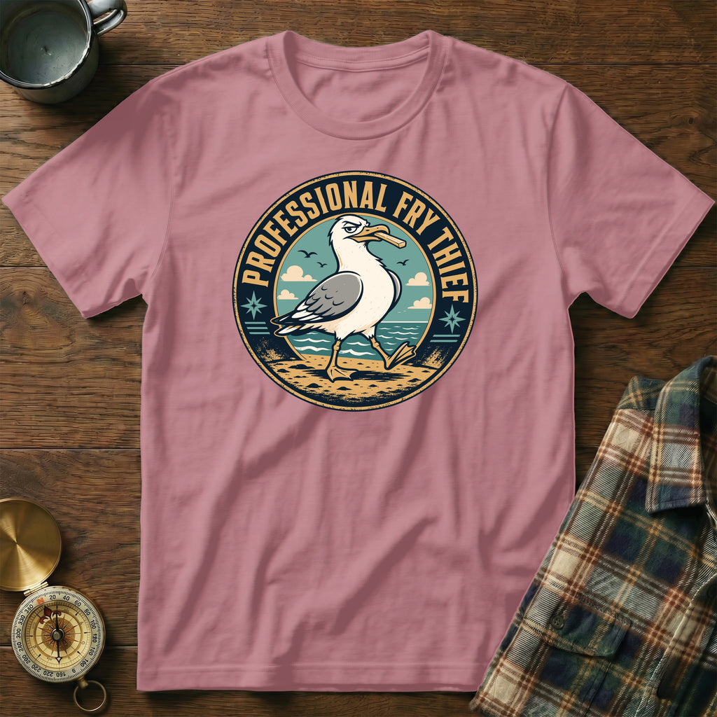 T-shirt with a seagull design that says "Professional Fry Thief"