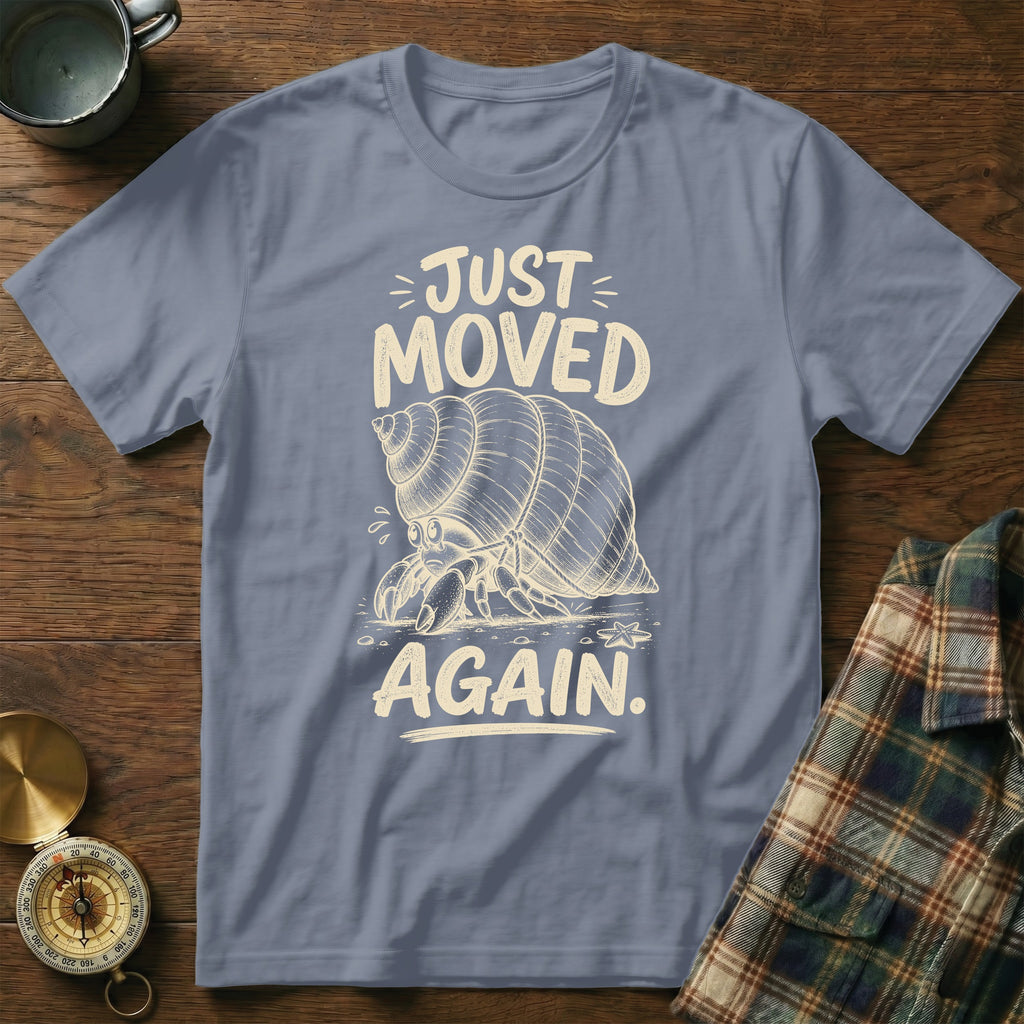 T-shirt with hermit crab graphic and text "JUST MOVED AGAIN".