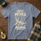 T-shirt with hermit crab graphic and text "JUST MOVED AGAIN".