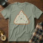 Green t-shirt with a concentric mountain graphic and compass.