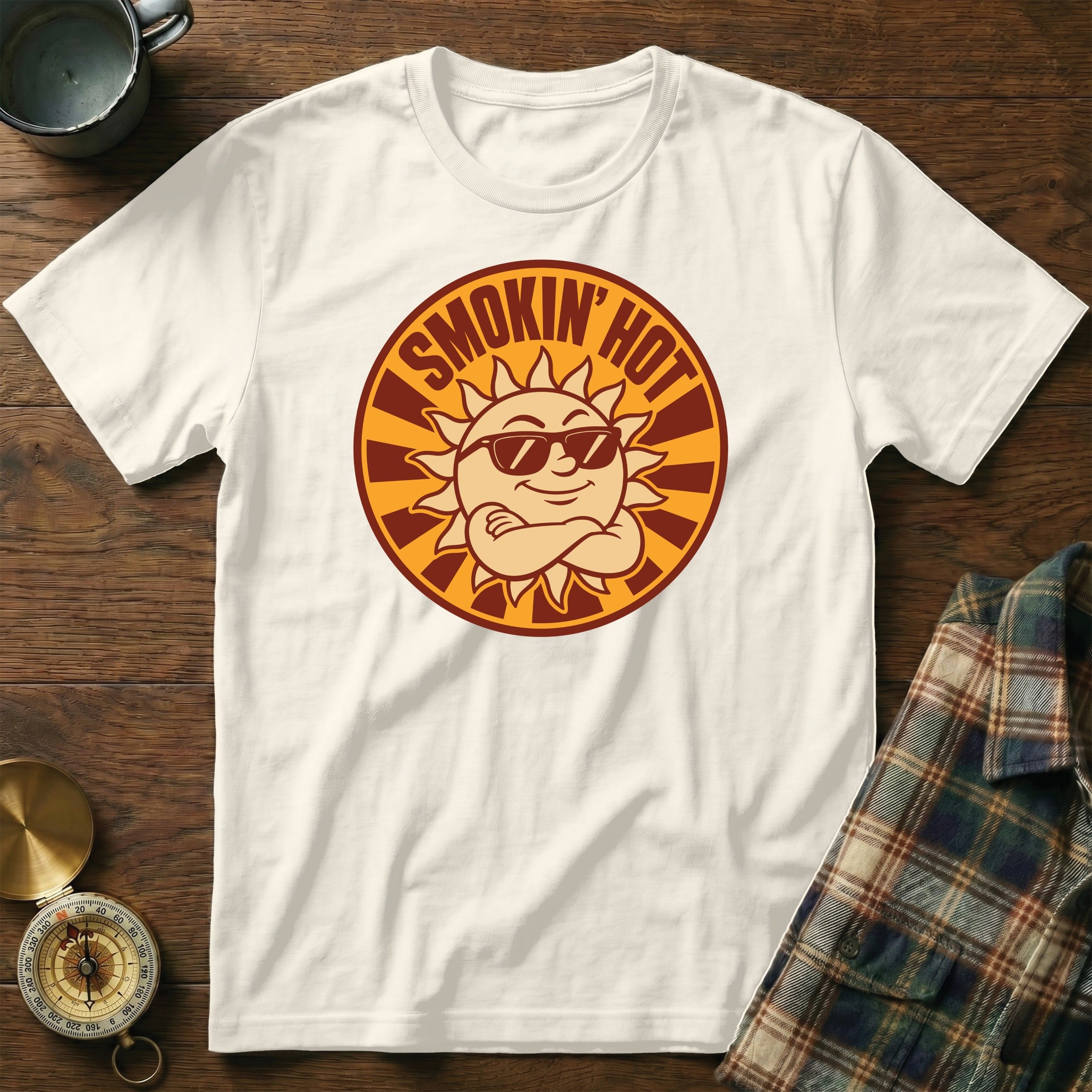 White t-shirt with "Smokin' Hot" text and cartoon sun graphic.