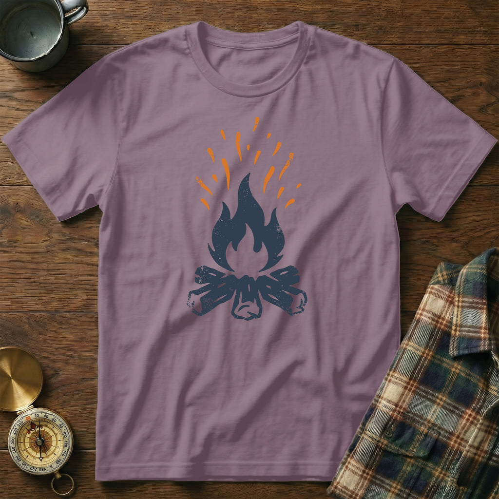 Purple t-shirt with a graphic of a campfire and flames.