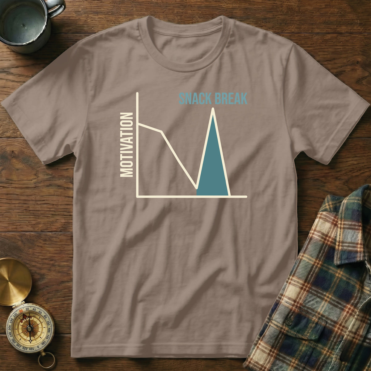 T-shirt with a graph showing motivation dipping for a "snack break".