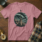 Pink t-shirt with a circular graphic of a wooden oar and crashing ocean waves.