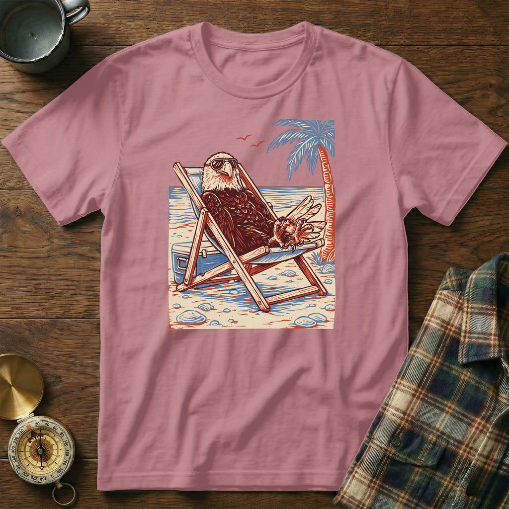 Eagle wearing sunglasses relaxes in a beach chair next to a palm tree.