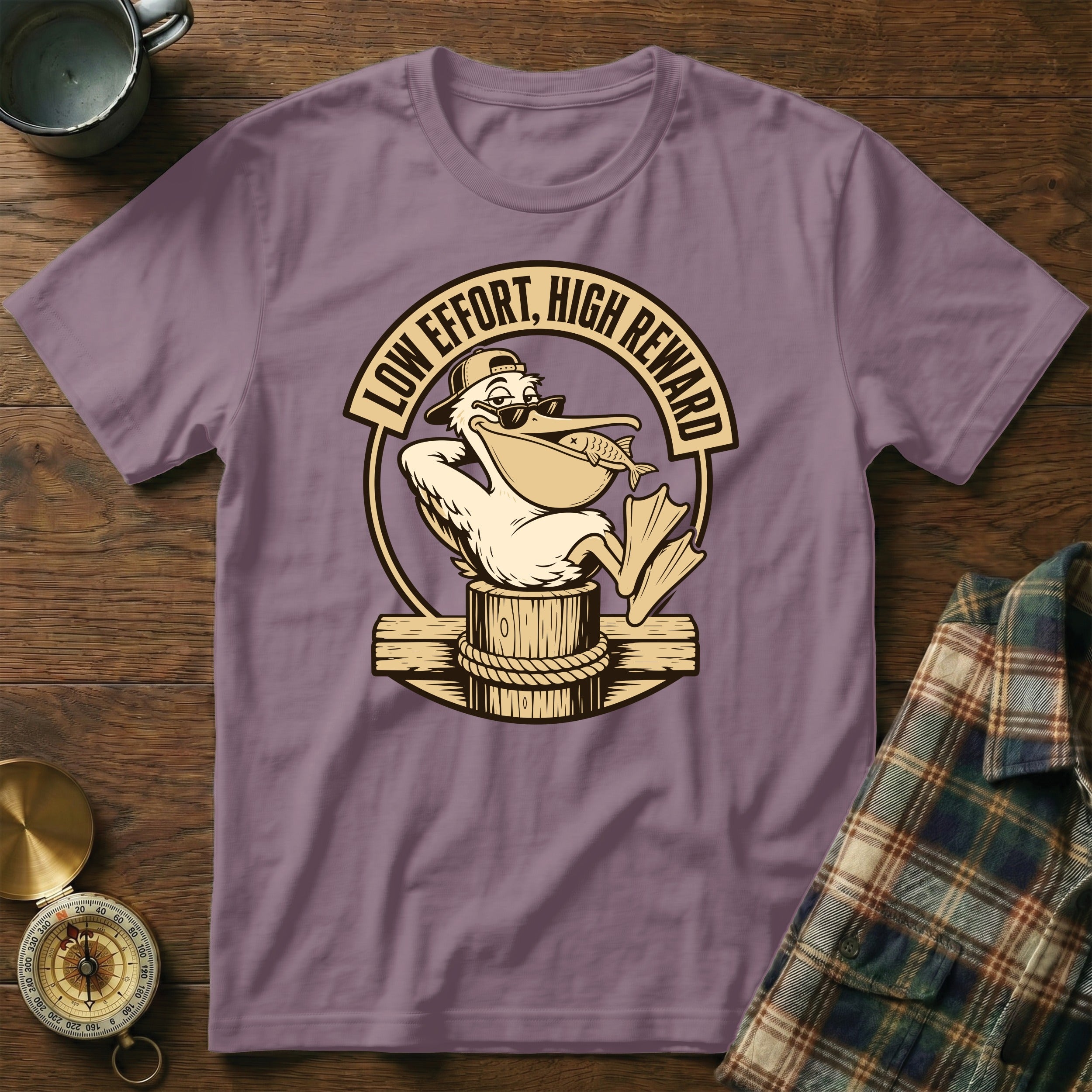 Purple t-shirt with a pelican graphic and text "LOW EFFORT, HIGH REWARD".