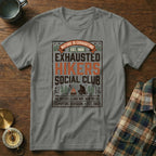 "Exhausted Hikers Social Club" t-shirt with campfire and nature graphics.