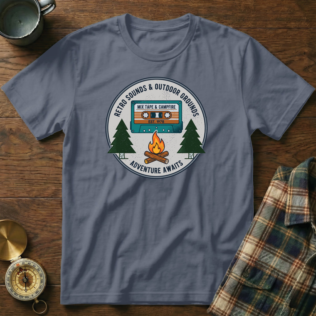 T-shirt with "Retro Sounds & Outdoor Grounds" mixtape and campfire design.