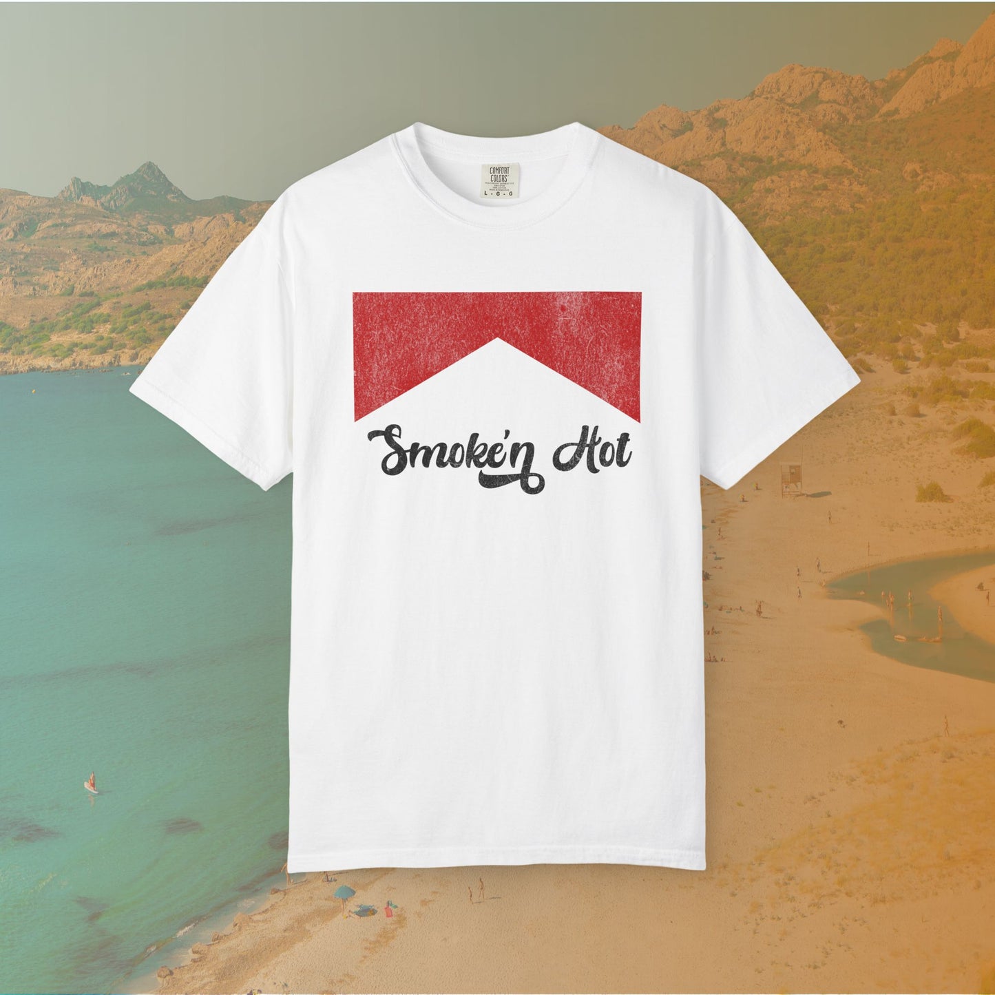 white Graphic T-shirt featuring a distressed red chevron shape with the black script text "Smokin' Hot" centered below it, in a vintage style.