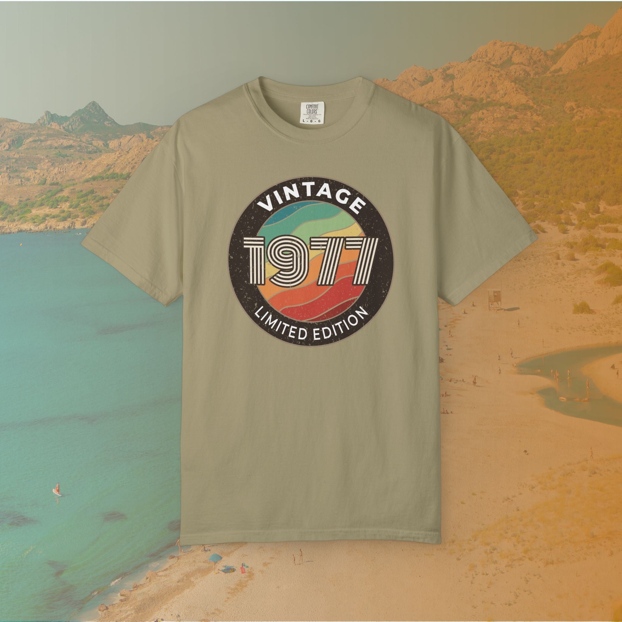 Khaki Retro-style circular graphic featuring the year 1977 in a bold, lined font over a distressed, multi-colored wavy background. The outer border reads "VINTAGE" at the top and "LIMITED EDITION" at the bottom. 