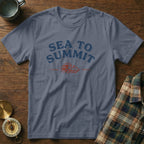 Slate blue t-shirt with "SEA TO SUMMIT" text and mountain wave graphic.