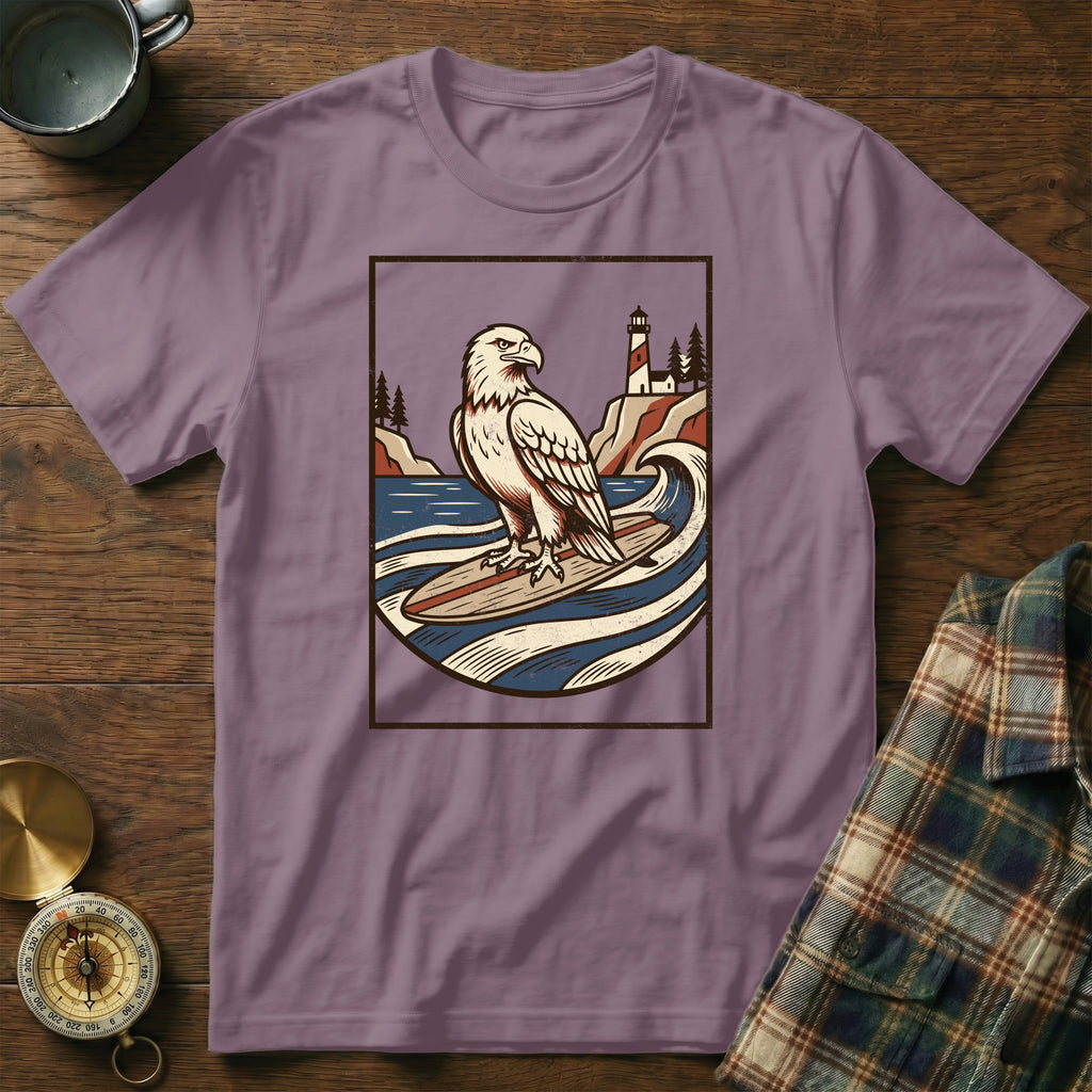 Eagle surfing at sea with lighthouse and rocky coastline in background.