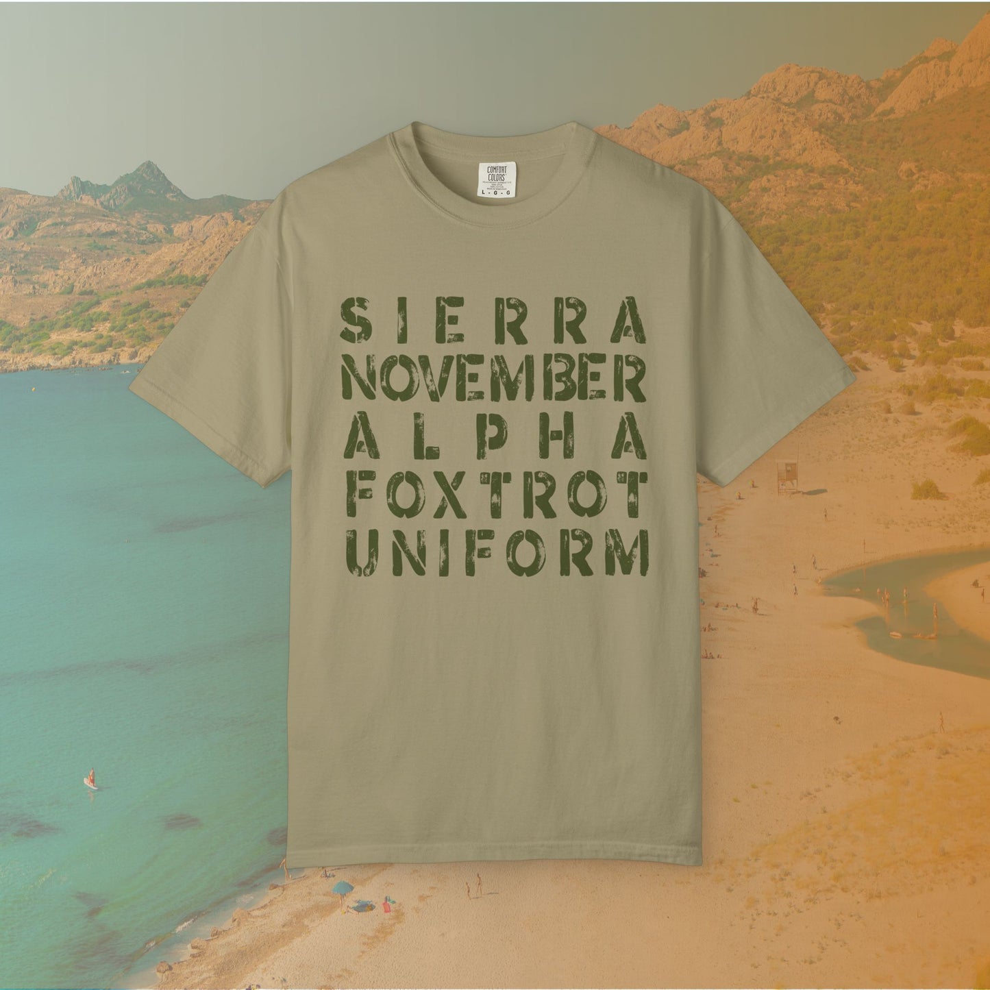 khaki t-shirt Graphic T-shirt featuring the NATO phonetic alphabet words "SIERRA NOVEMBER ALPHA FOXTROT UNIFORM" in a large, distressed stencil font.