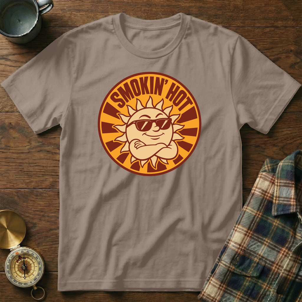 T-shirt with cartoon sun graphic and "SMOKIN' HOT" text.