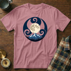 Pink t-shirt with a round graphic of a full moon over snowy mountains and trees.