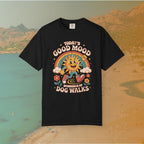 black  t-shirt Retro 70s-style graphic t-shirt featuring a running, happy cartoon sun in sneakers under a rainbow and clouds. The slogan reads: "TODAY'S GOOD MOOD SPONSORED BY DOG WALKS."