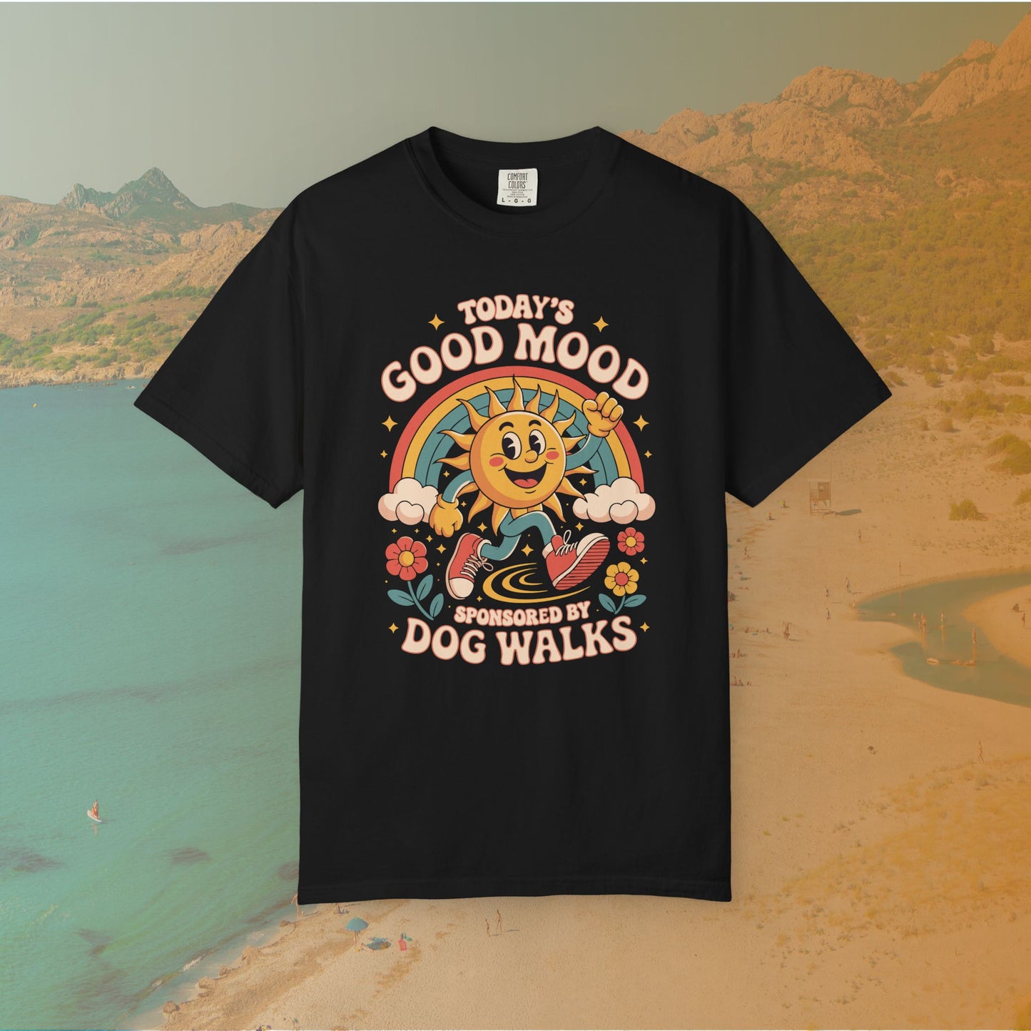 black  t-shirt Retro 70s-style graphic t-shirt featuring a running, happy cartoon sun in sneakers under a rainbow and clouds. The slogan reads: "TODAY'S GOOD MOOD SPONSORED BY DOG WALKS."