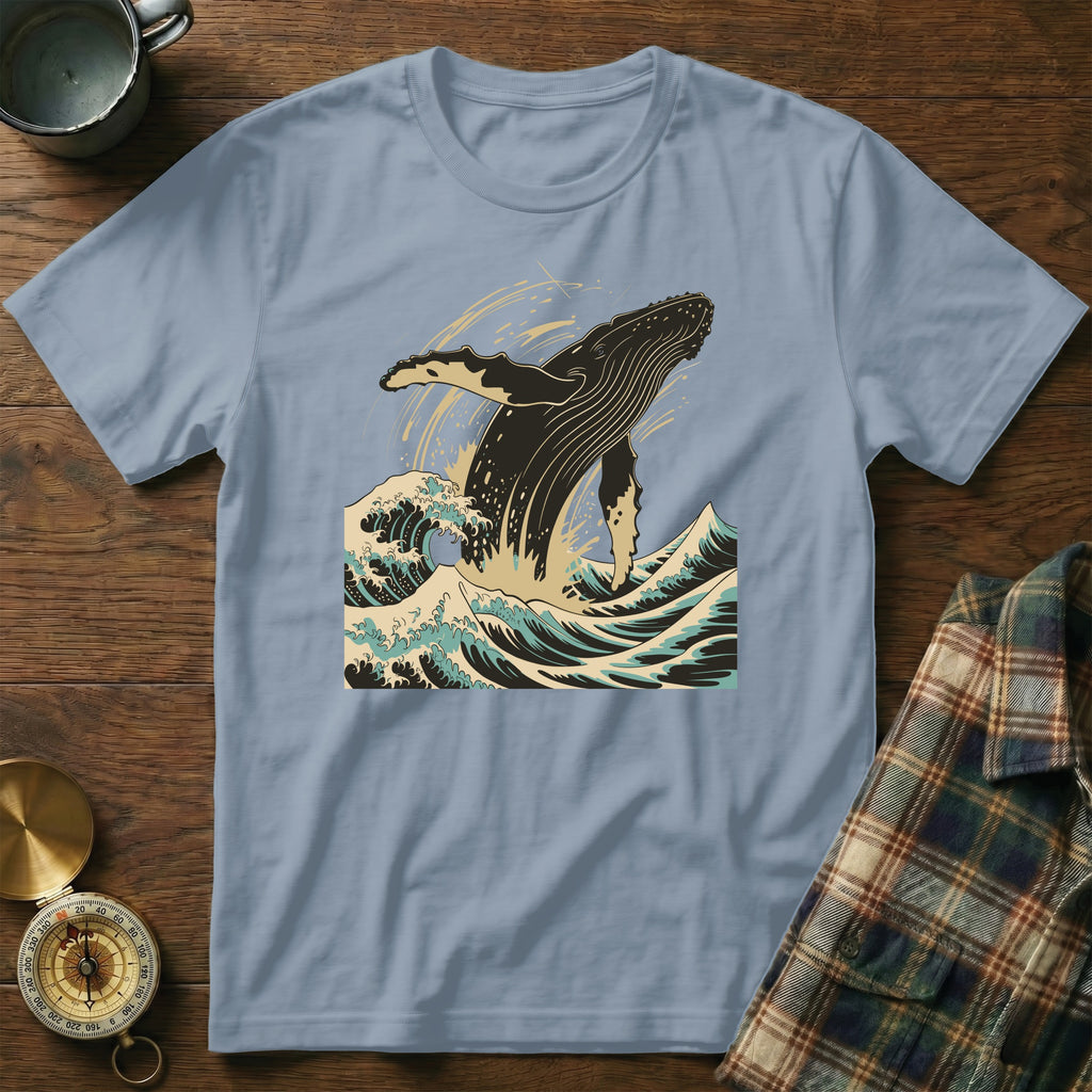 T-shirt with a breaching whale and crashing waves design.
