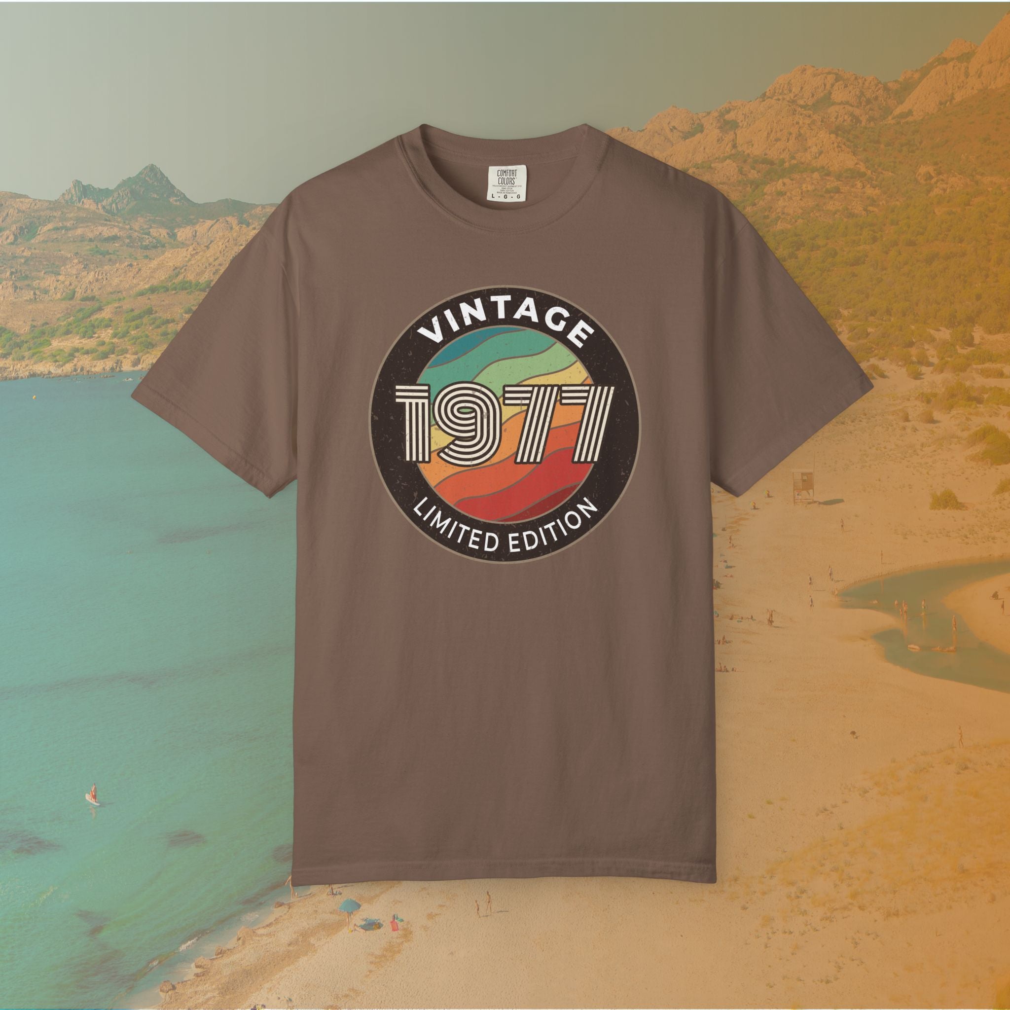 Brown Retro-style circular graphic featuring the year 1977 in a bold, lined font over a distressed, multi-colored wavy background. The outer border reads "VINTAGE" at the top and "LIMITED EDITION" at the bottom. 