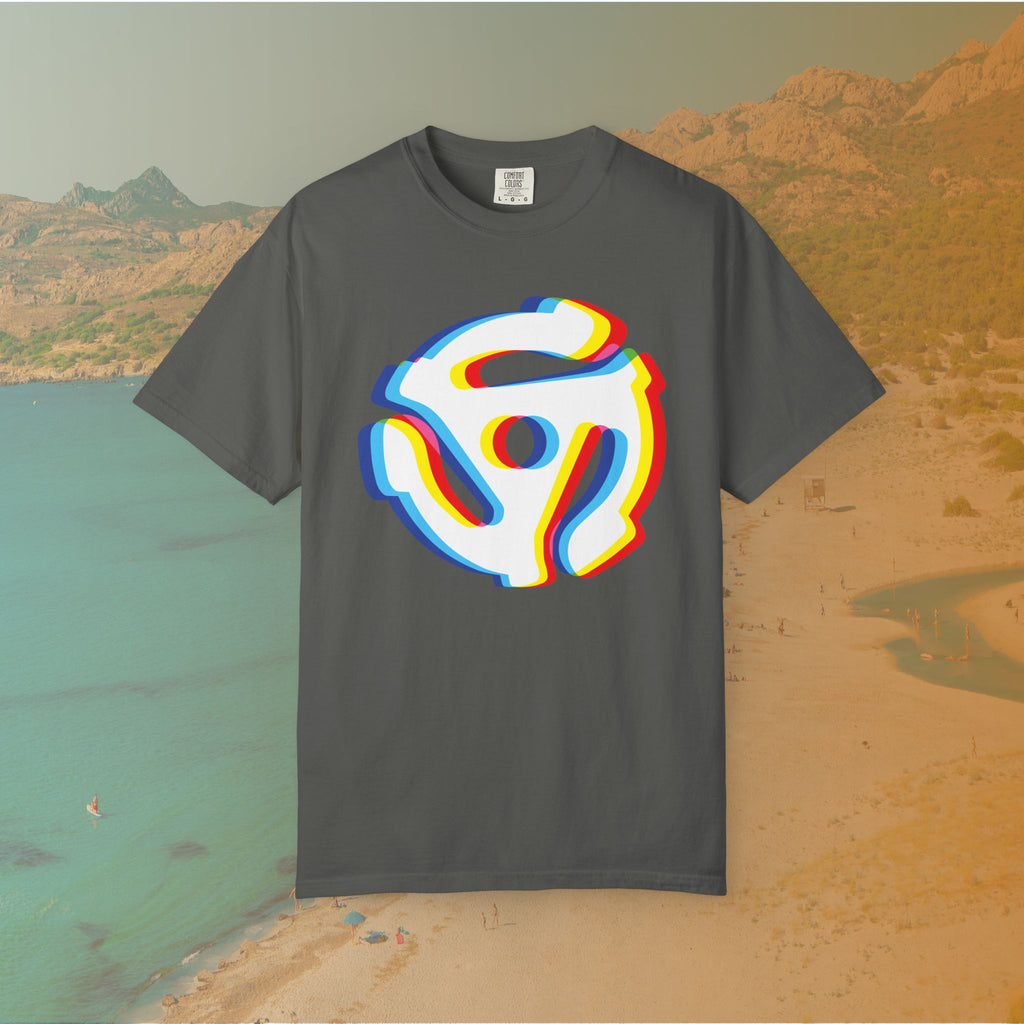 grey t-shirt with a graphic of a white 45 RPM vinyl record adapter (dink) with a red, yellow, blue, and cyan chromatic aberration/glitch effect, ready for EDM festival apparel