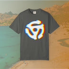 grey t-shirt with a graphic of a white 45 RPM vinyl record adapter (dink) with a red, yellow, blue, and cyan chromatic aberration/glitch effect, ready for EDM festival apparel