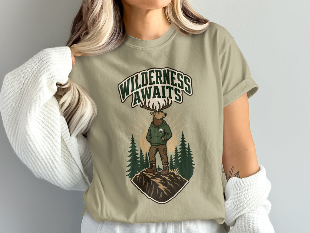 T-shirt graphic with elk and "Wilderness Awaits" text.