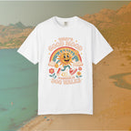 white  t-shirt Retro 70s-style graphic t-shirt featuring a running, happy cartoon sun in sneakers under a rainbow and clouds. The slogan reads: "TODAY'S GOOD MOOD SPONSORED BY DOG WALKS."