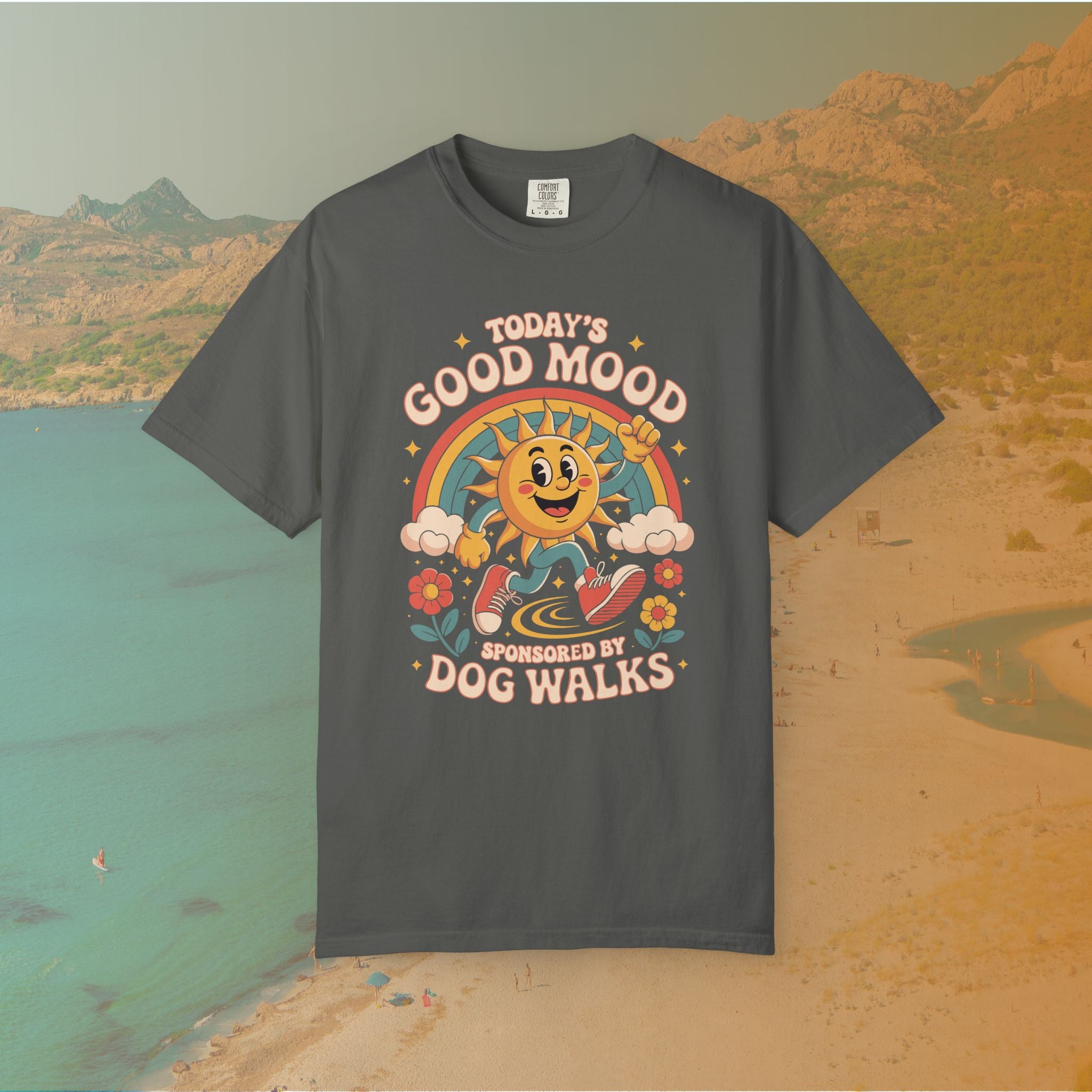 grey  t-shirt Retro 70s-style graphic t-shirt featuring a running, happy cartoon sun in sneakers under a rainbow and clouds. The slogan reads: "TODAY'S GOOD MOOD SPONSORED BY DOG WALKS."