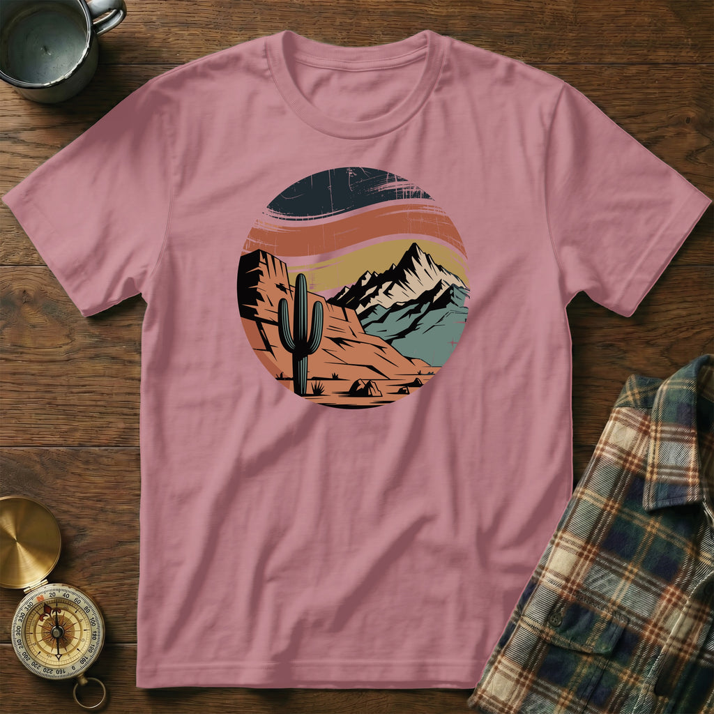T-shirt with desert mountain landscape graphic and cactus.