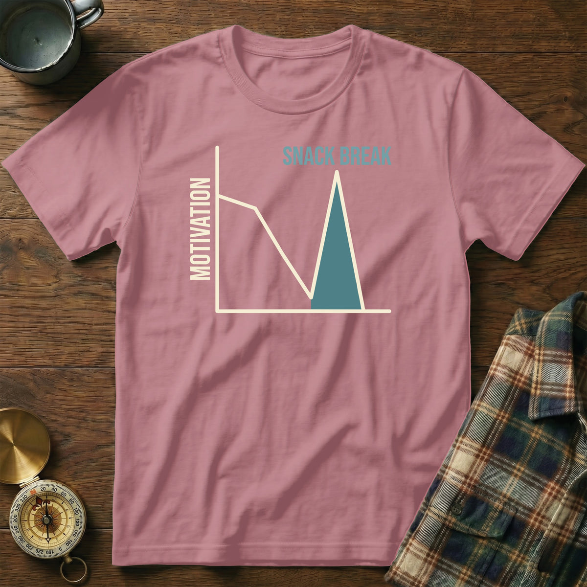Pink t-shirt with graph showing a motivation dip for a snack break.