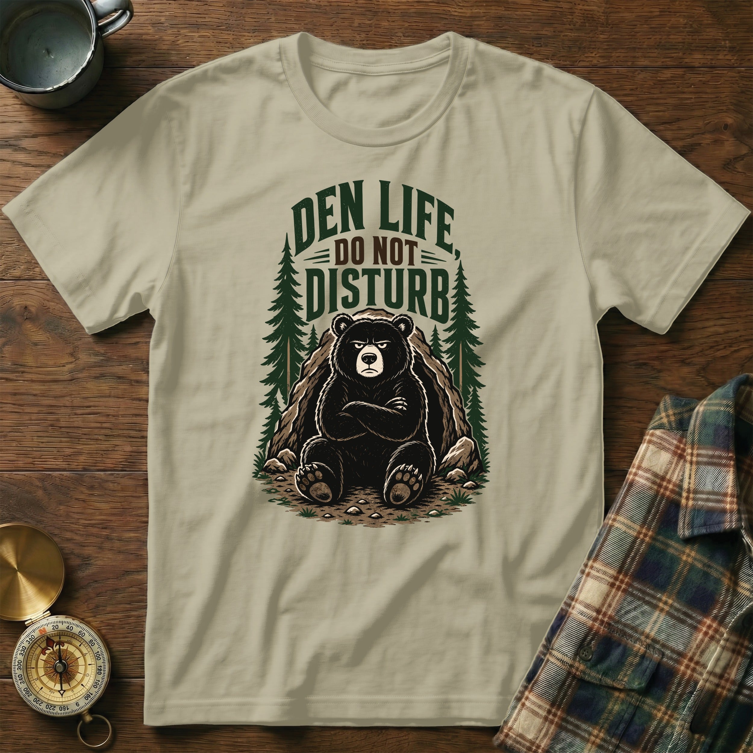 T-shirt with a grumpy bear graphic that reads "DEN LIFE DO NOT DISTURB."