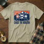 T-shirt with cassette graphic featuring mountains, sun, road, and "CHASE THE HORIZON" text.