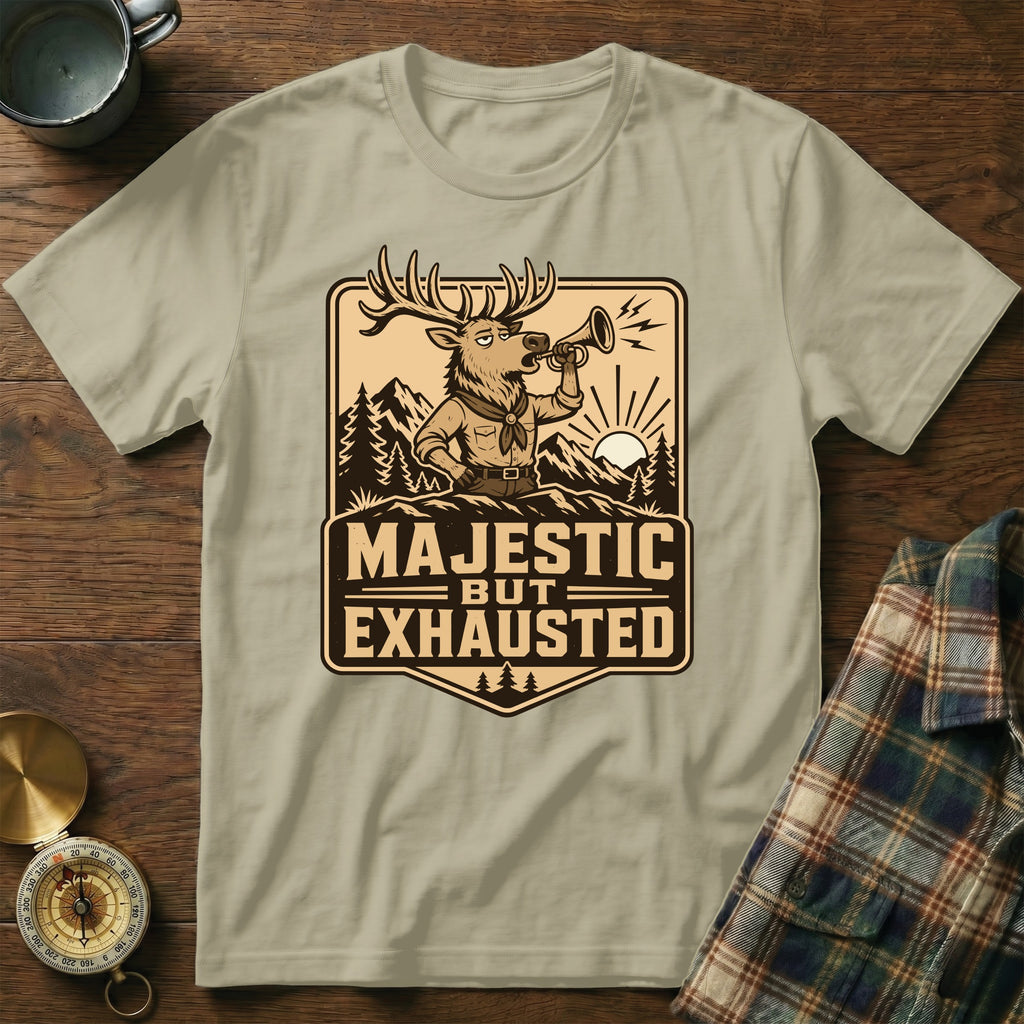 T-shirt with a cartoon deer blowing a horn, text "MAJESTIC BUT EXHAUSTED".