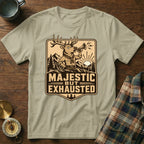 T-shirt with a cartoon deer blowing a horn, text "MAJESTIC BUT EXHAUSTED".