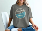 Grey t-shirt with a pie chart graphic labeled "Miles," "Complaining," and "Snacks."