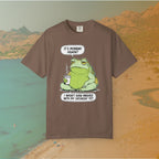 Brown T-shirt Funny T-shirt graphic featuring a large, grumpy toad holding a to-go coffee cup. The cartoon is captioned with the quotes: "IT'S MONDAY AGAIN? I WASN'T EVEN FINISHED WITH MY SATURDAY YET.