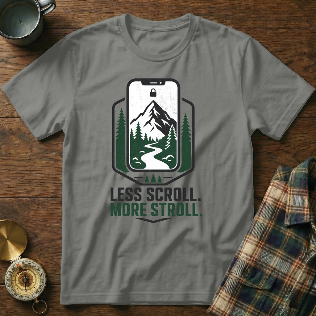 Grey t-shirt with "Less Scroll. More Stroll." and mountain phone graphic.