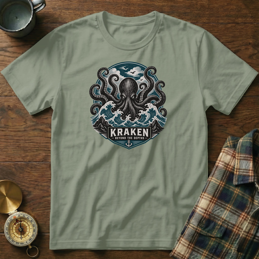 Green t-shirt with Kraken octopus design, waves, mountains, and text.