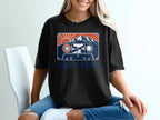 Black t-shirt with cassette tape design featuring mountains, sun, and the text "Chase the Horizon."