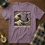 Purple t-shirt with "The Unexplained Tide" and a UFO over a crashing wave.